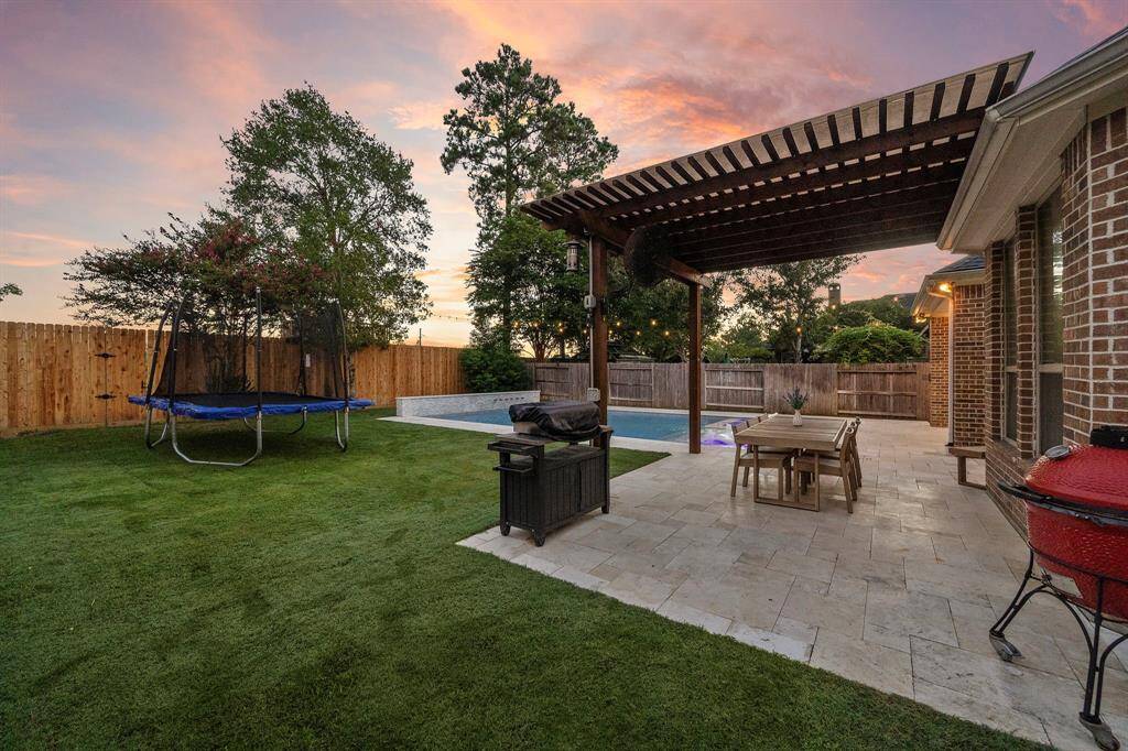 With a large yard and resort-style pool, this outdoor space is ideal for both relaxation and recreation.