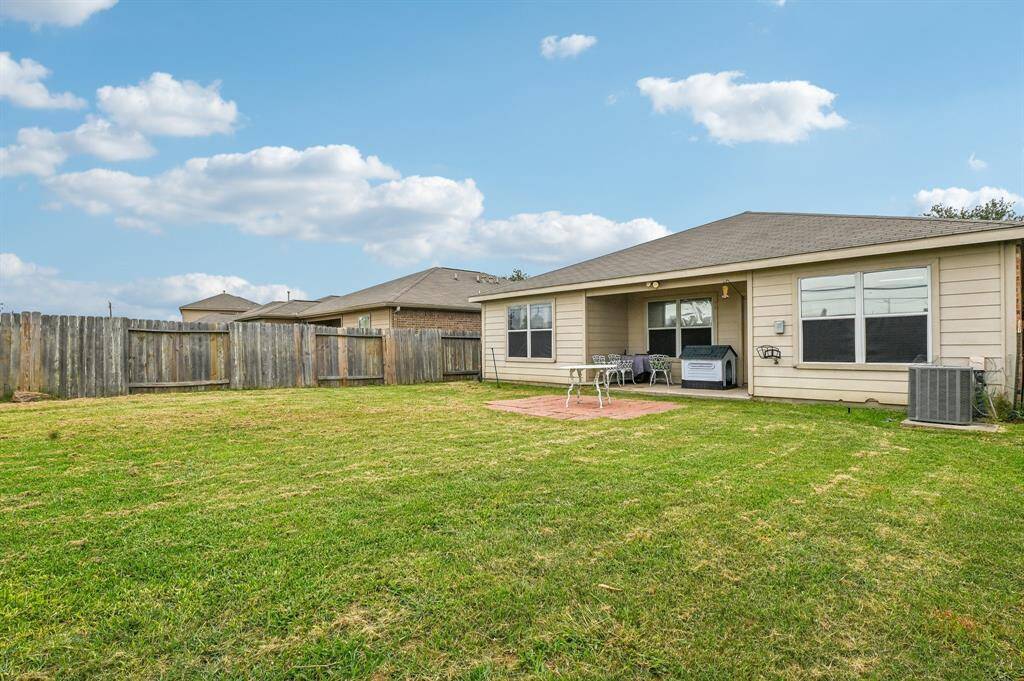 Nice size backyard, offering perfect balance of open space and privacy