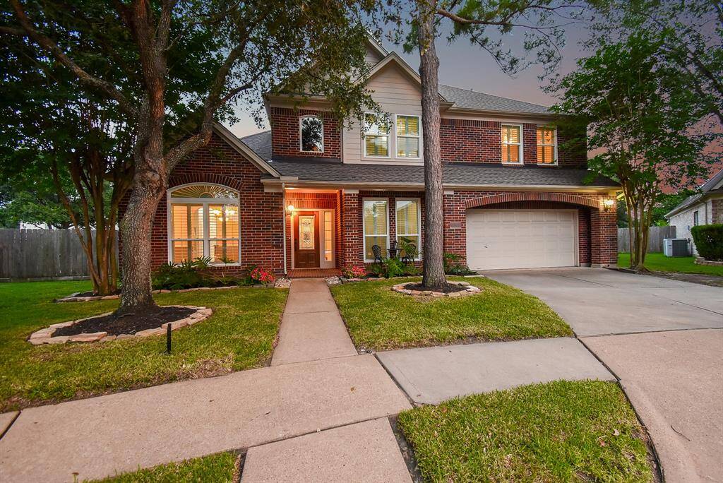 Stunning home in desirable Copper Lakes neighborhood. Majestic mature trees canopy over the front lawn and beautiful brick elevation. All the beautiful windows in the home are new - double pain and energy efficient.