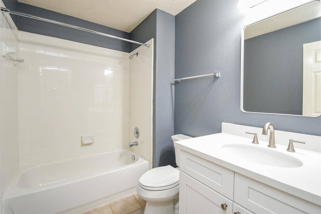 Second full bathroom upstairs with shower/tub combo.