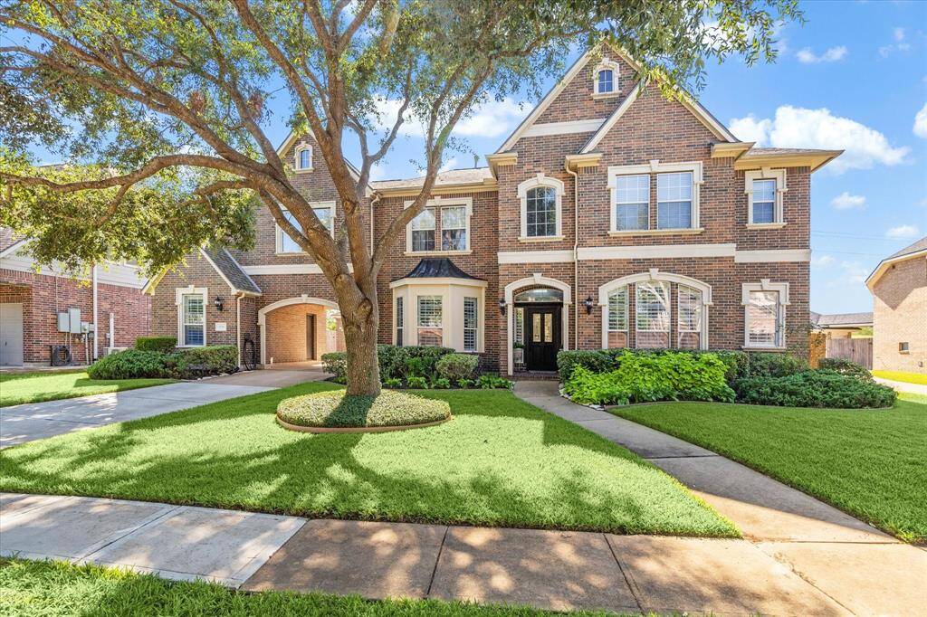 Welcome home to 8718 Stowe Creek Ln in the wonderful neighborhood of Sienna! A charming two-story brick home featuring a beautiful landscaped yard offering great curb appeal.