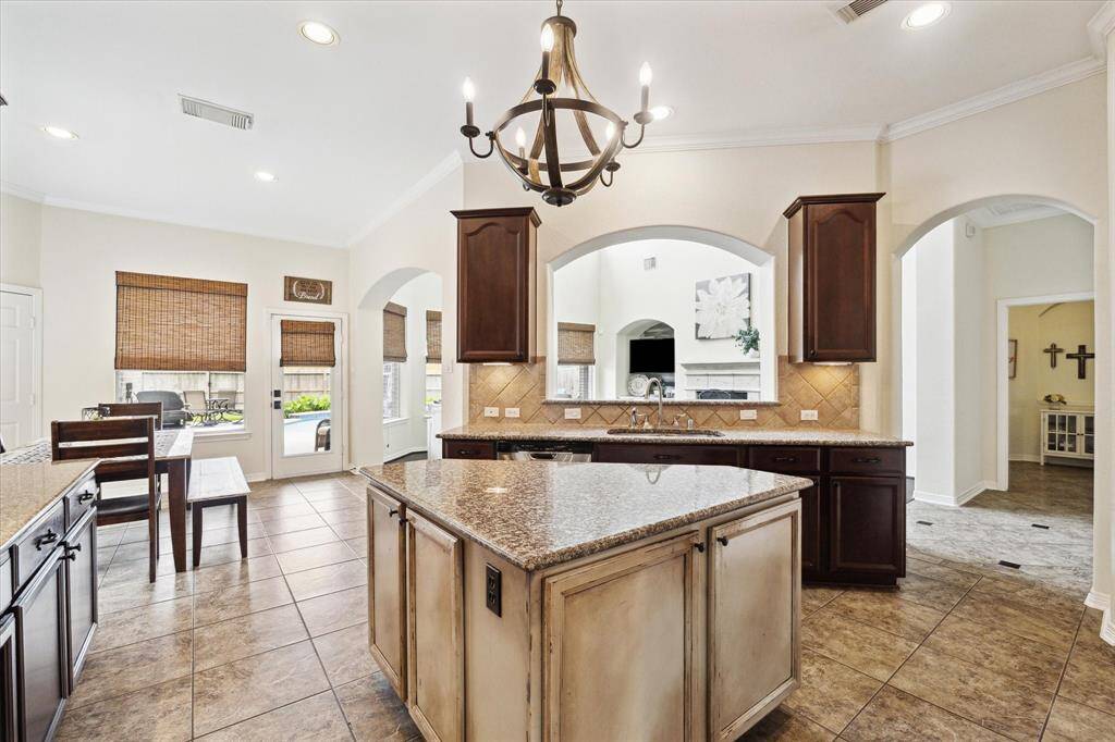 The kitchen opens to the living room, creating an easy flow for entertaining family and guests.