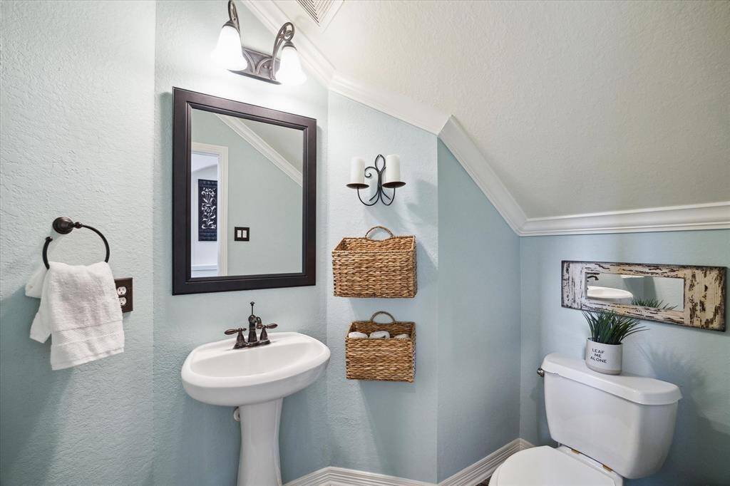 A half bathroom, ideally situated just off the main living area, perfect for guest convenience.