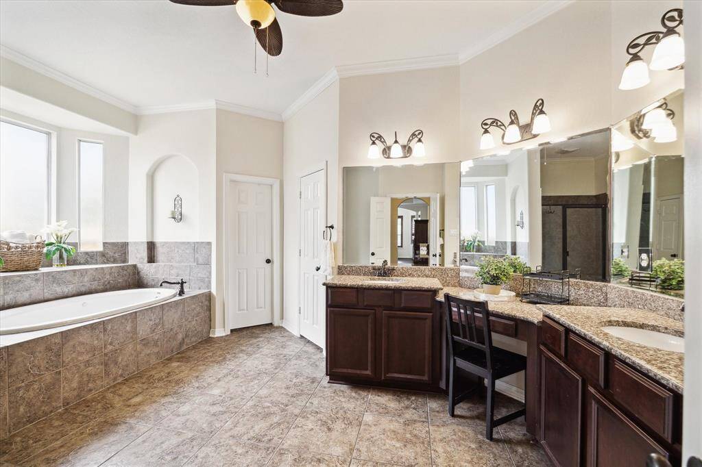 Dual vanities offer ample space, ideal for shared use, while dual closets provide plenty of space and storage for all your stylish clothing.