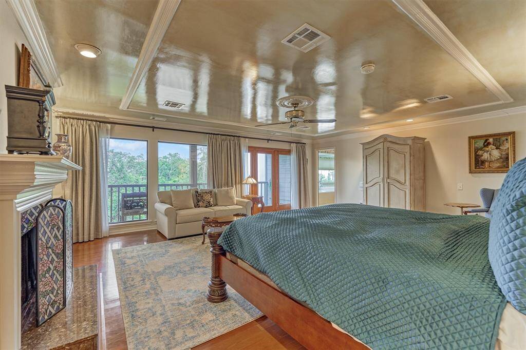 Located just off the primary bedroom showcases a large balcony with water views