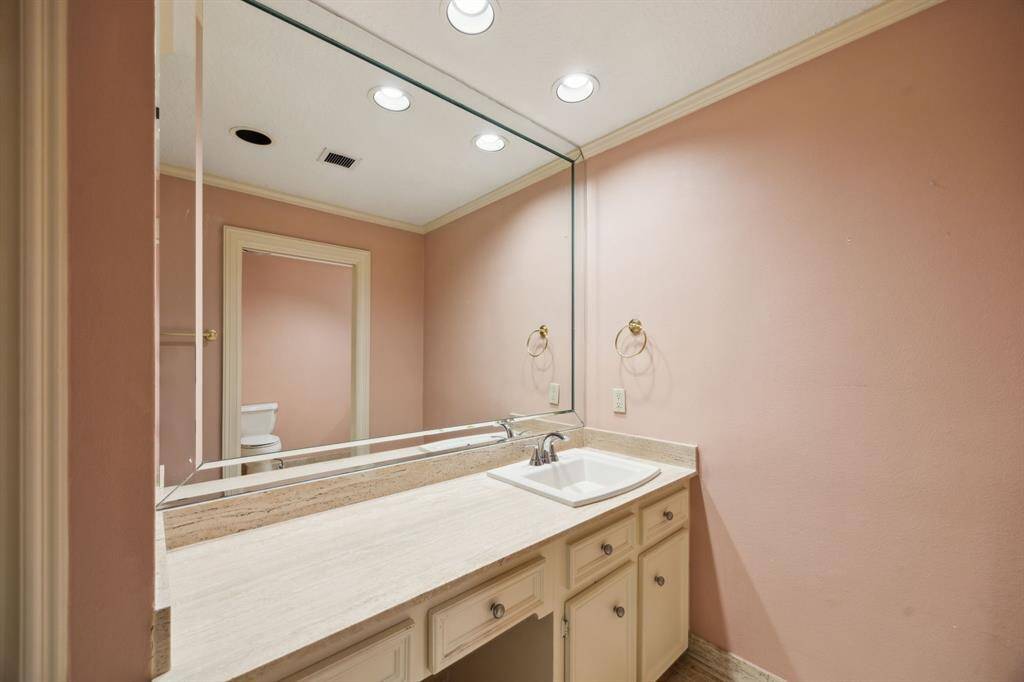 Second primary bath sink area with access to the walk in tub.