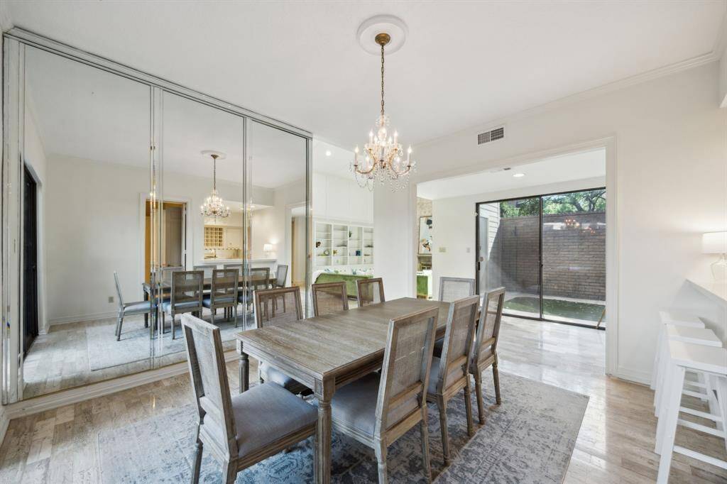 Another view of the dining room looking out onto one of two outdoor areas.