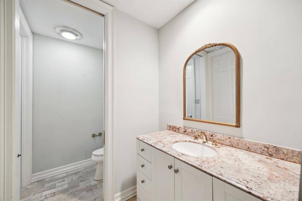 Convenient powder room with a ton of storage.