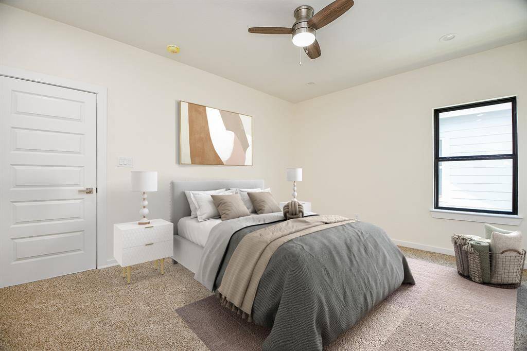 Upstairs secondary bedrooms feature plush carpet, ceiling fans and recessed lighting.