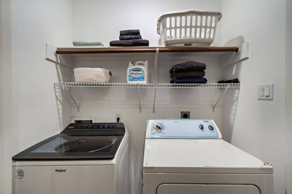 In house laundry located on the 1st floor just outside the primary bedroom.