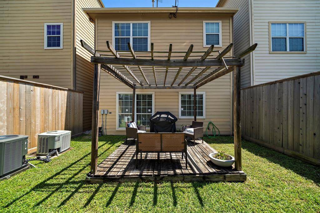 Endless enjoyment to be had in this backyard with covered deck and no back neighbors.