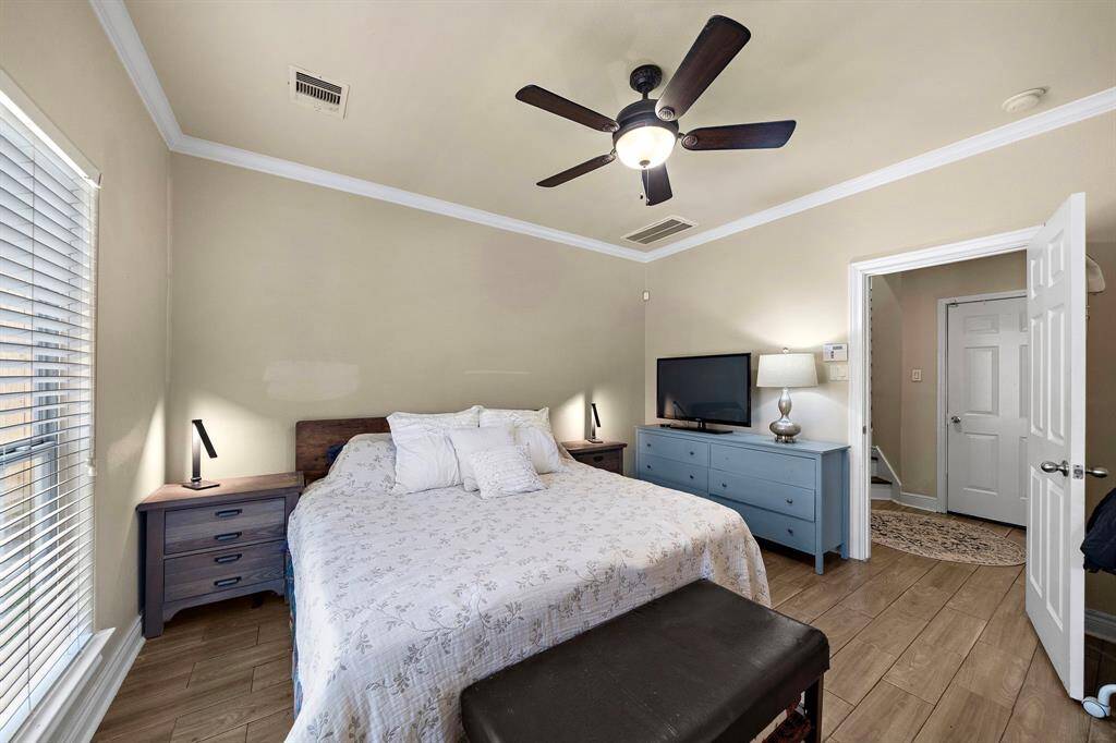 The primary bedroom is conveniently located on the 1st floor with large window overlooking the backyard.