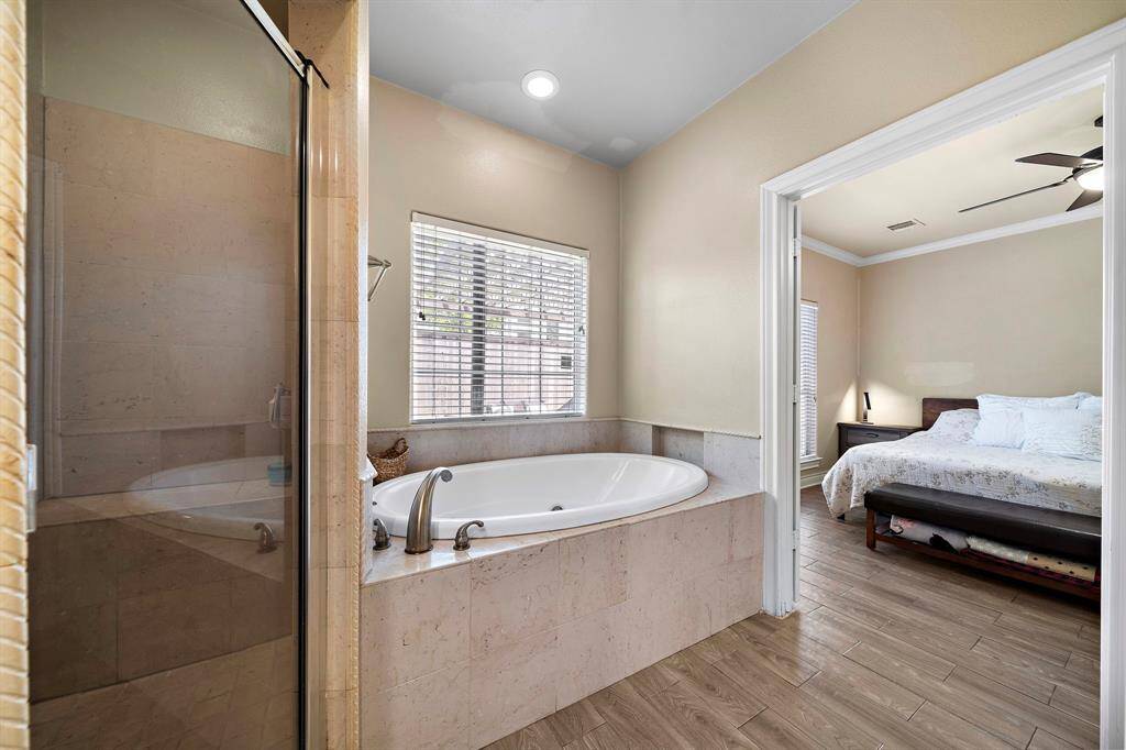 The large jetted tub with separate shower.