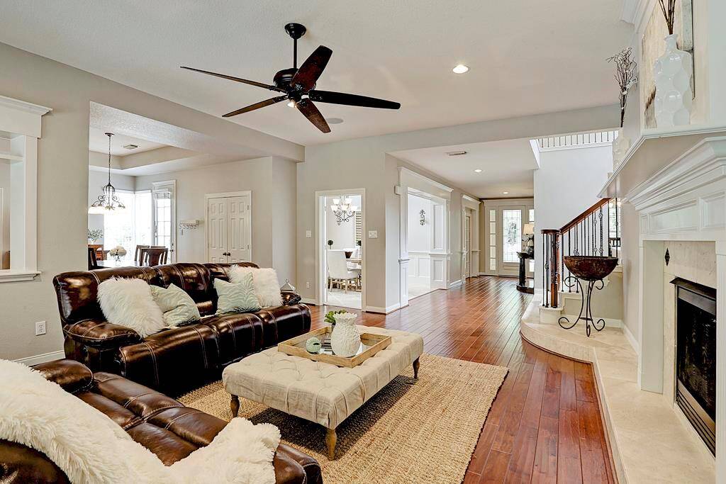The family room enjoys being open to an enormous kitchen and breakfast room for effortless entertaining.