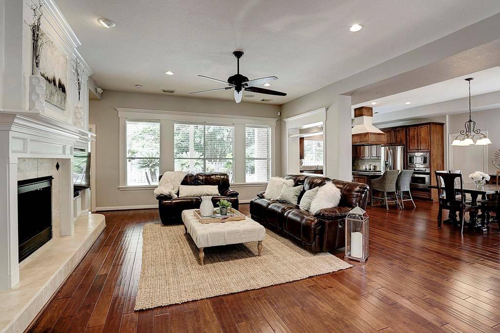 Windows and doorways in this home are trimmed with beautiful millwork.  The row of windows in the family room overlooks the sparkling pool and spa.