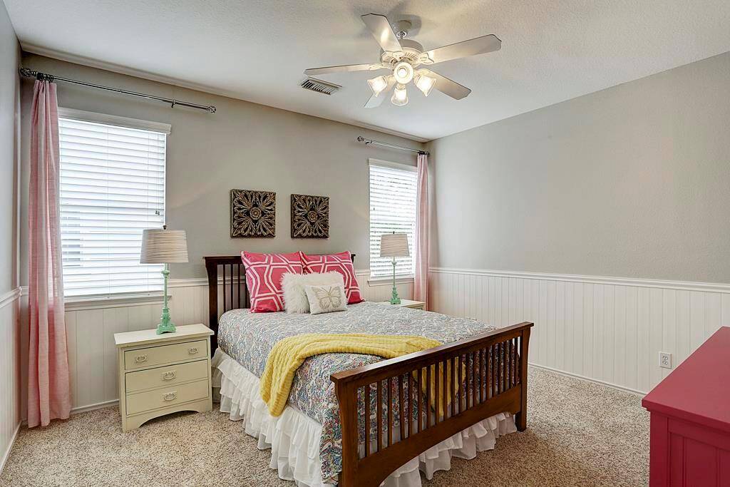 One of three bedroom suites on the second level.  Each bedroom is generously sized and enjoys its own private full bath.