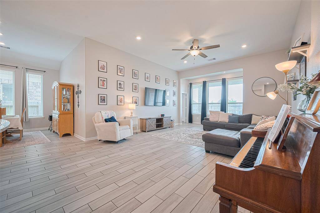 A different angle of what this spacious living room offers.