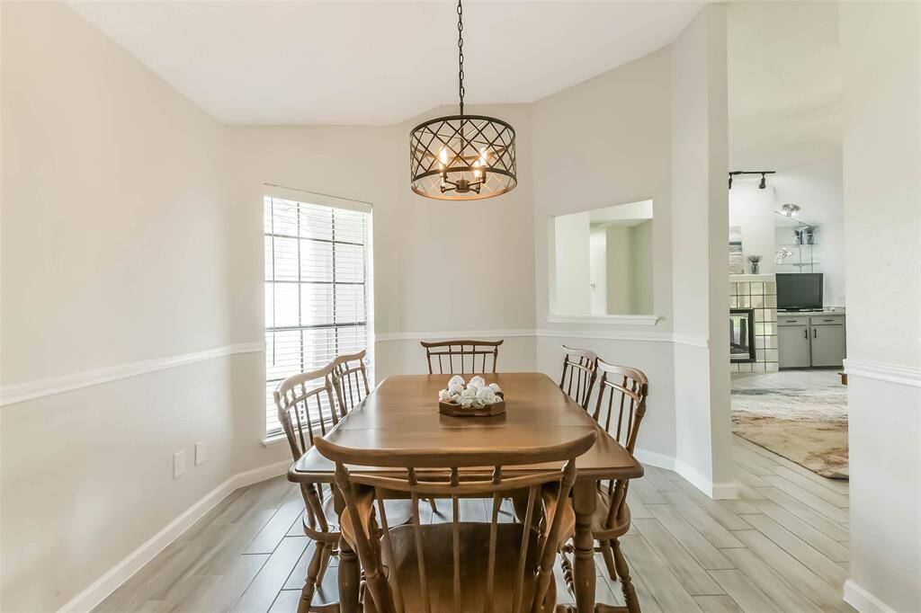 Formal dining has enough room for a large table and is open to the living room.