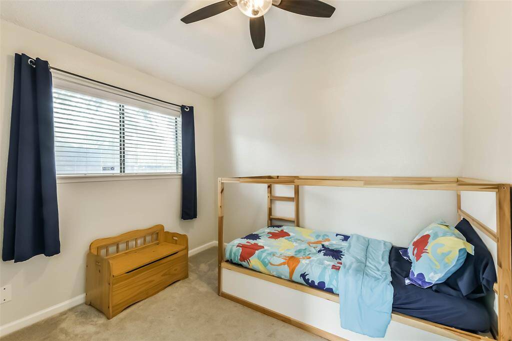 Bedroom four with ceiling fan.