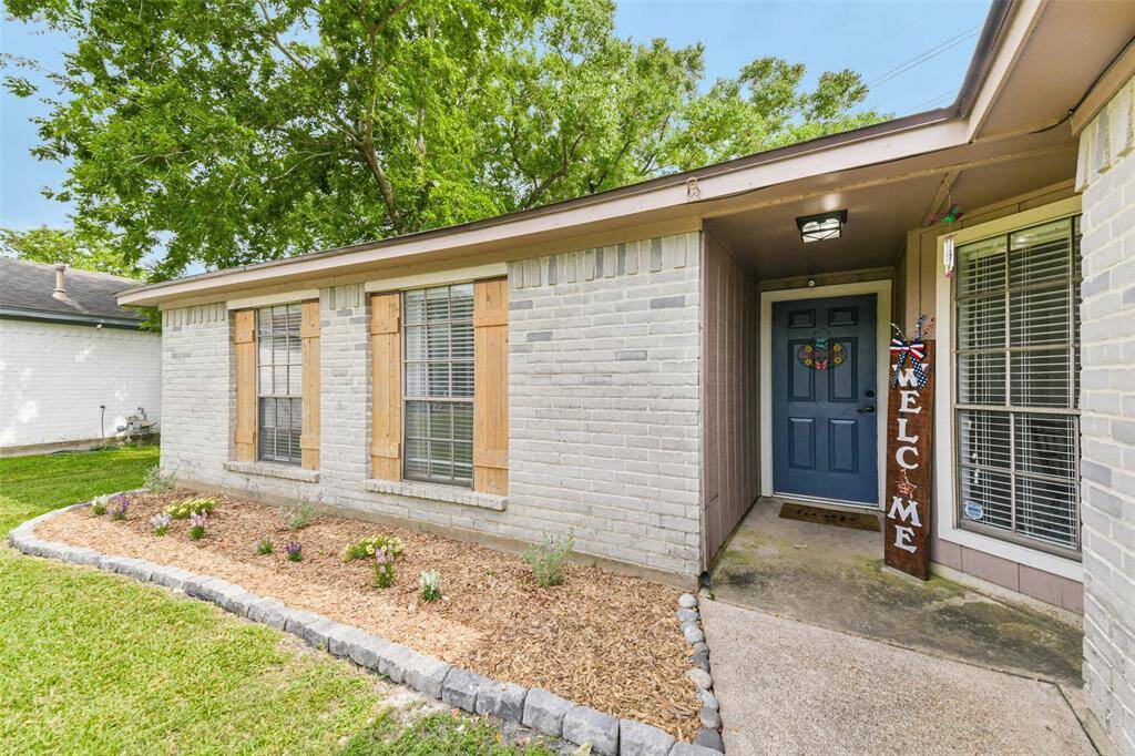 Recent landscaping and board and batten shutters give this home a fresh look.