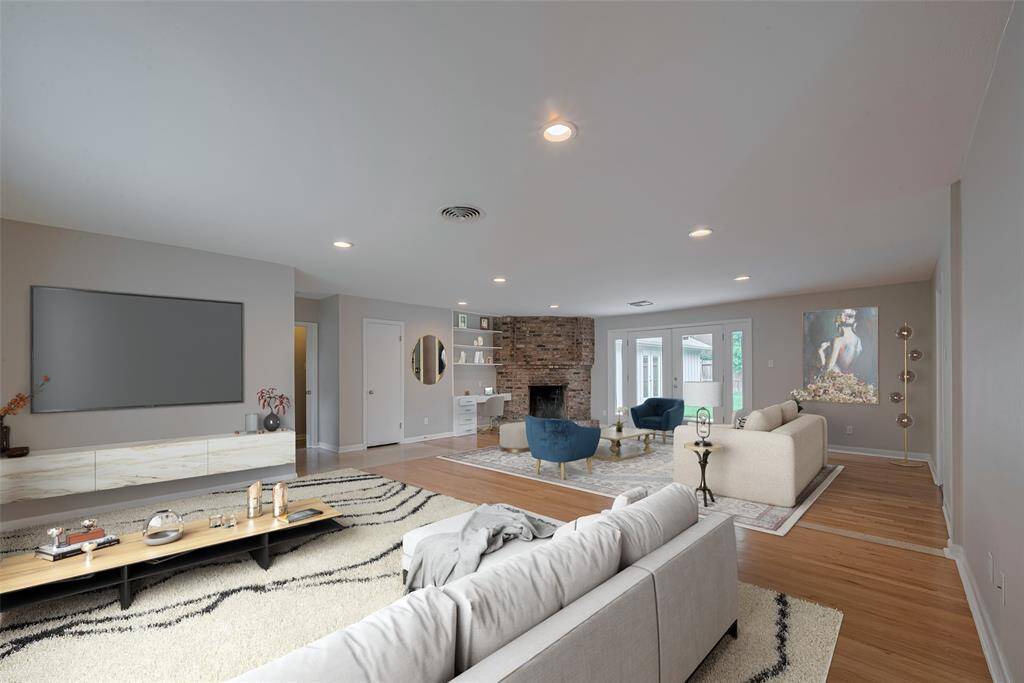 Virtually staged to display endless possibilities in the great room.