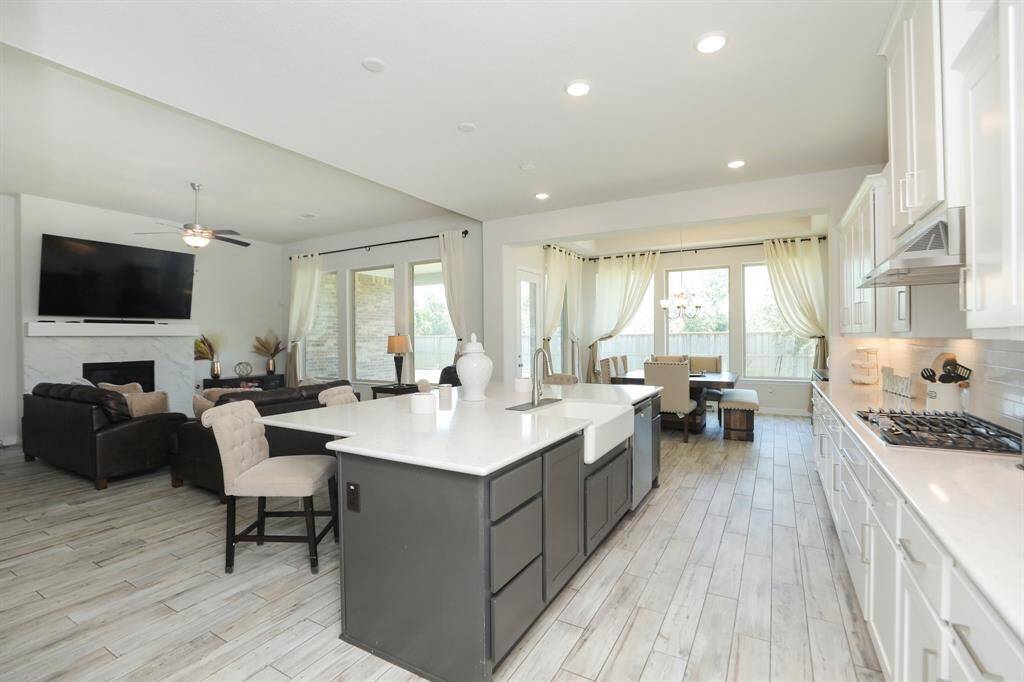Open concept with Kitchen overlooking Family Room and Breakfast Room.