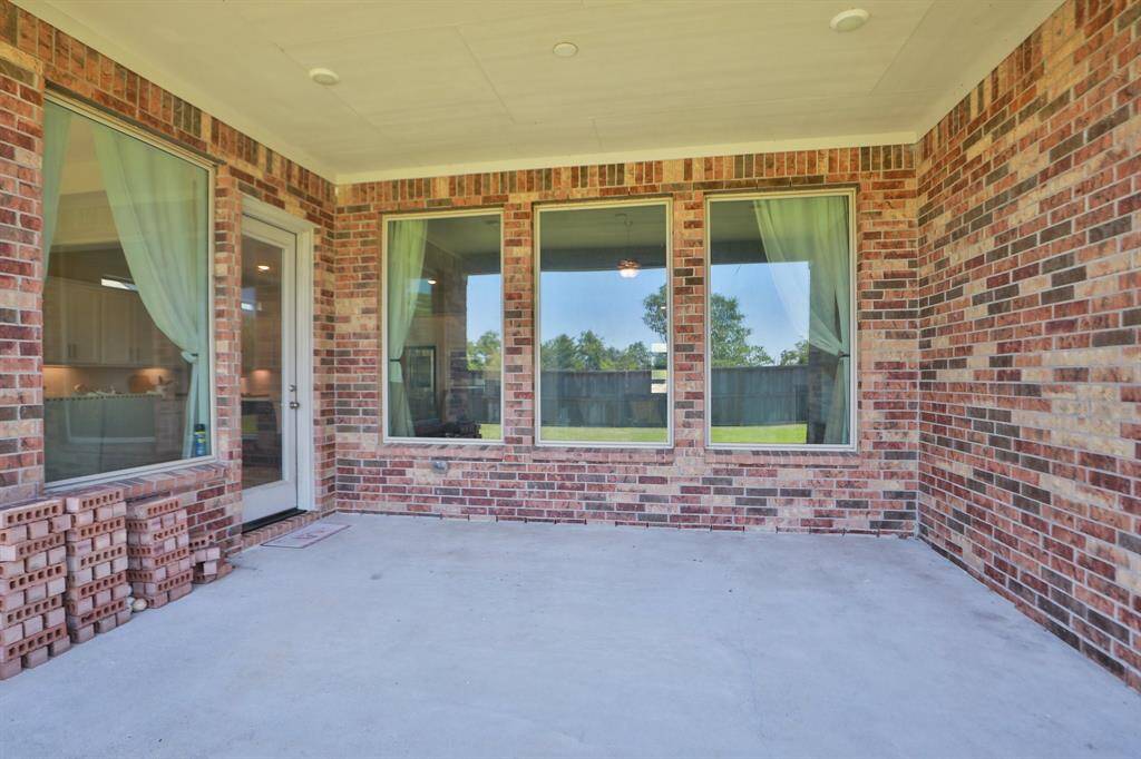 Covered Patio for sitting outside will keep the rain or sun off of you.