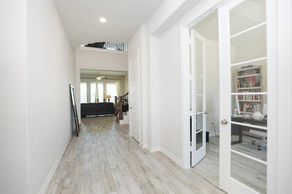 View as you enter the house, office with french doors on your right as you enter.