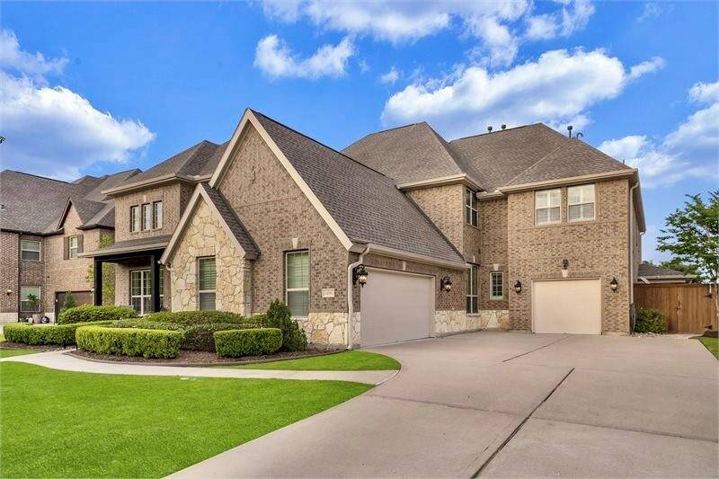 Plenty of driveway space for parking and 3-car garage equipped with automatic door openers for convenience.
