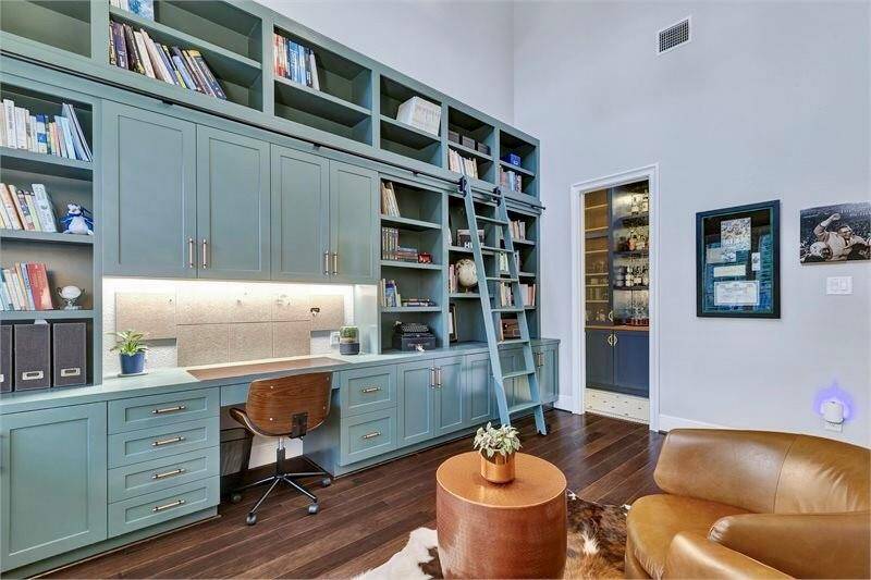 Attached to the study is a speakeasy-style custom bar creating the perfect end of day retreat.