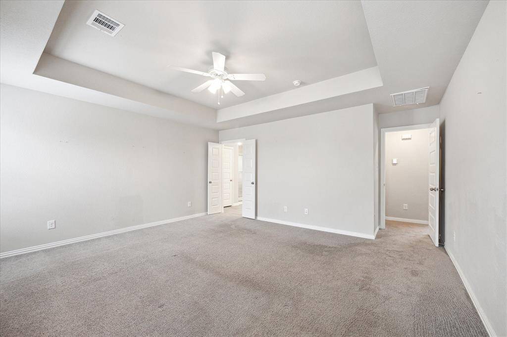 ANOTHER VIEW OF THE MASTER OPENING TO THE EN-SUITE BATH AND HUGE WALK-IN CLOSET.