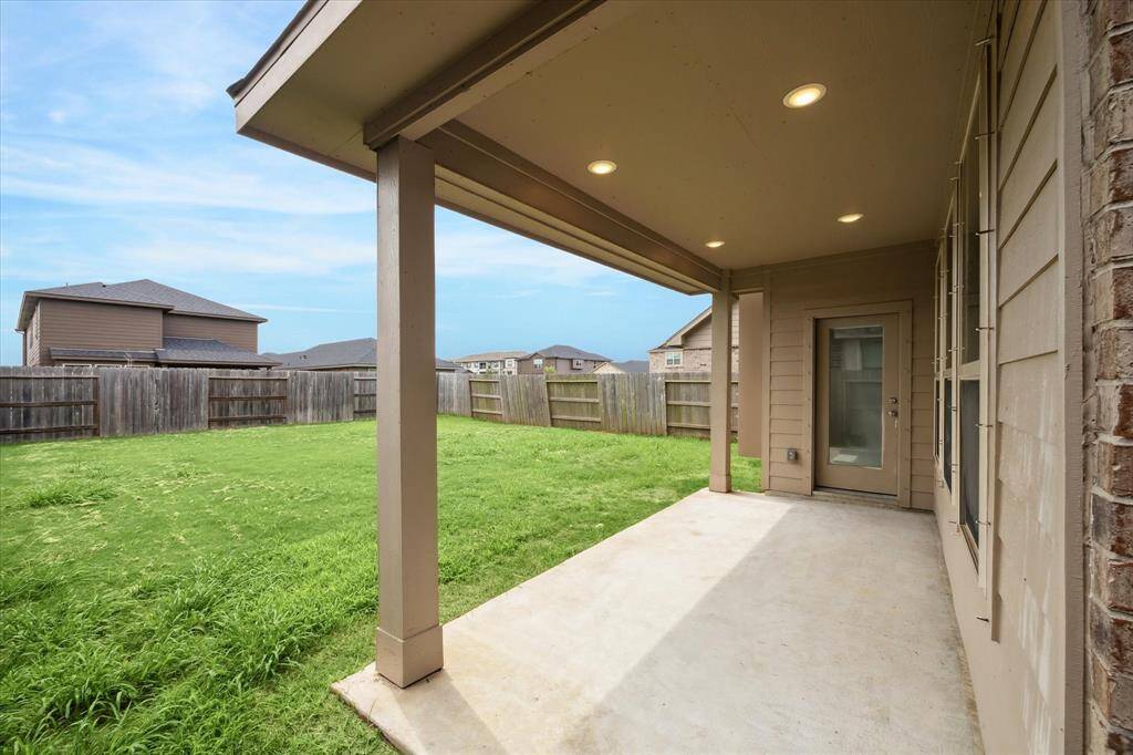 COVERED BACK PATIO.