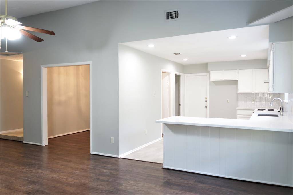 NICELY UPDATED KITCHEN WITH QUARTZ COUNTERTOPS