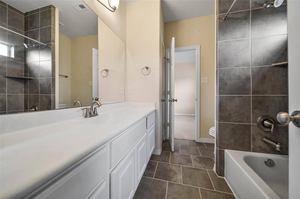 View of secondary bathroom #1.