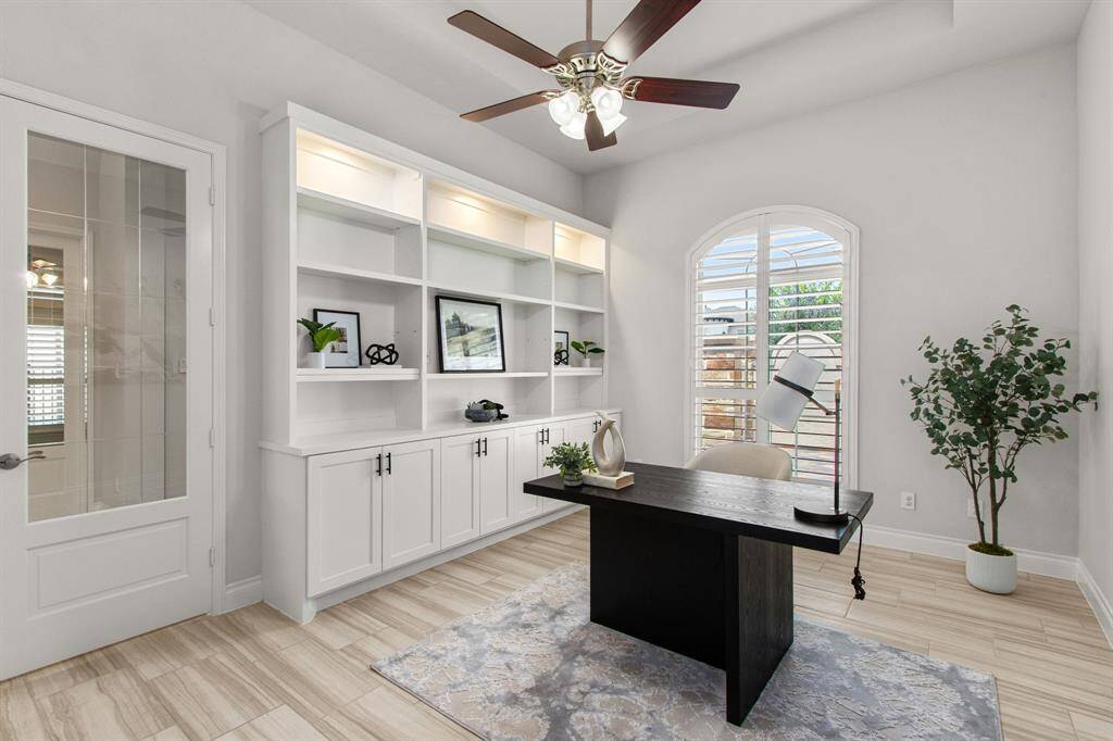 Home office/study with built-ins, located right inside the entry.