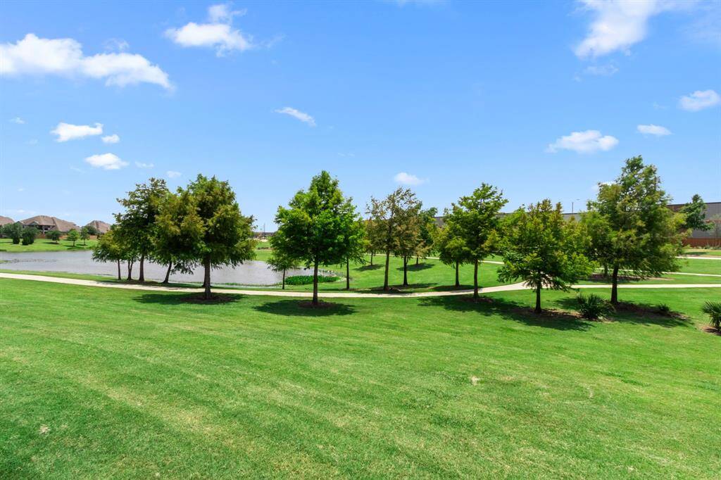 View of the greenbelt and lake behind you.