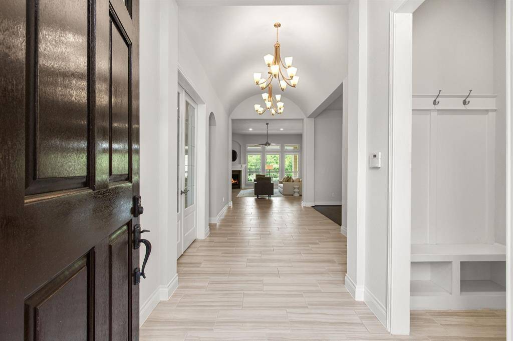 Spacious entry with high ceilings.