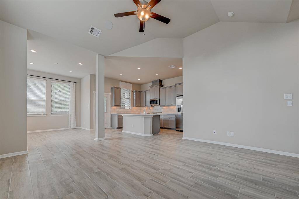 Open Dining, living and kitchen areas