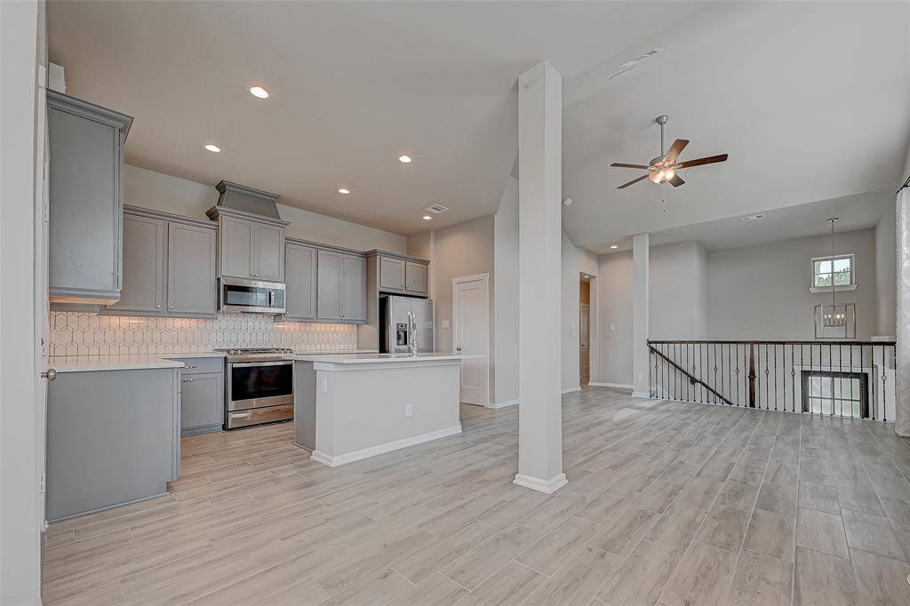 Second floor with kitchen, dining and living room combo