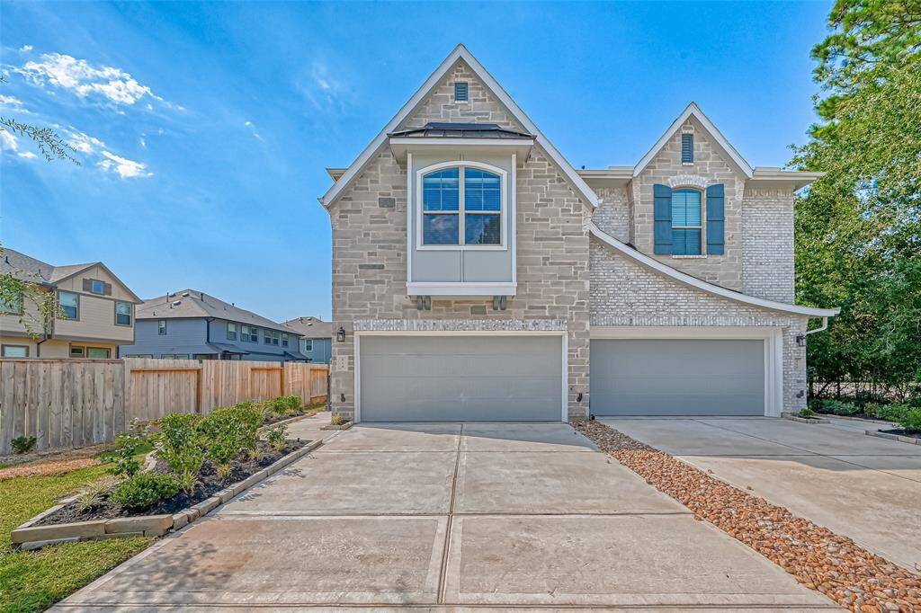 Townhome is the one on the left side