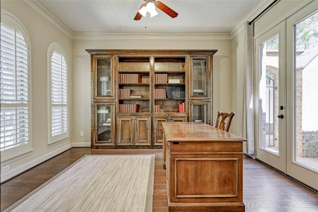 Office/Study with built-in bookcase. French doors opens to courtyard