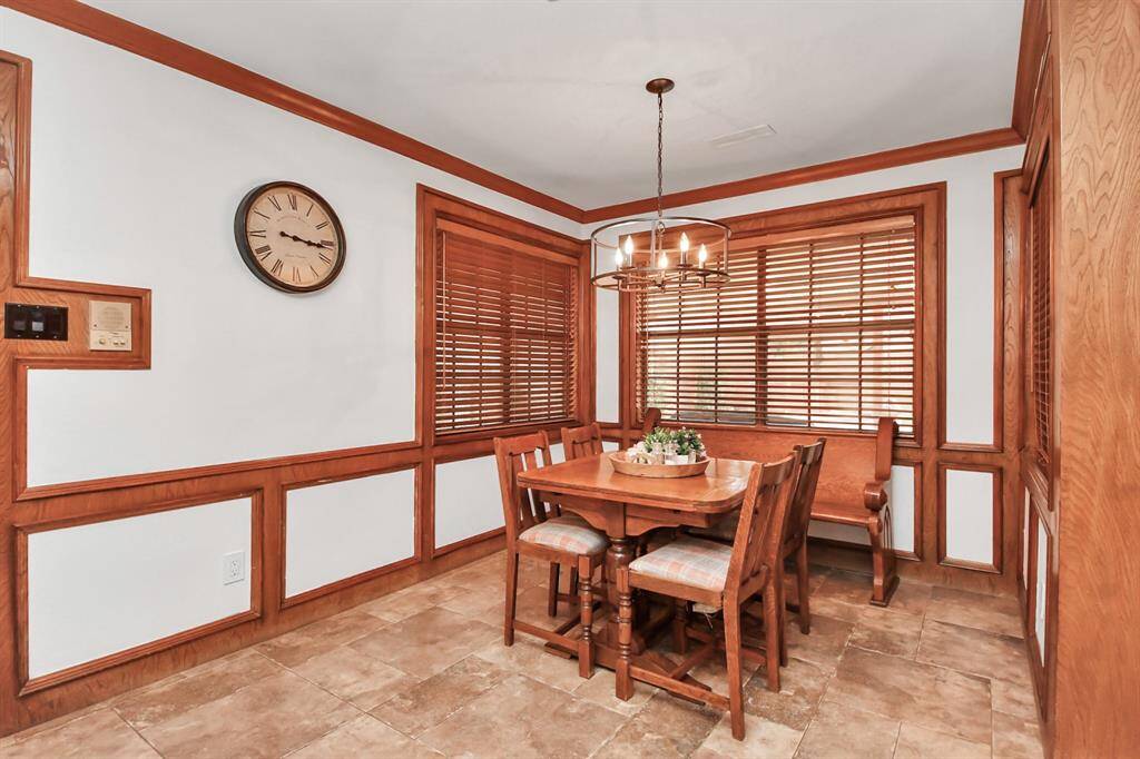 The classic architectural details of this home continue into the spacious breakfast area!