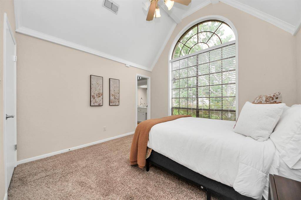 One of two secondary bedrooms, this one offers a window which bathes the room in light!