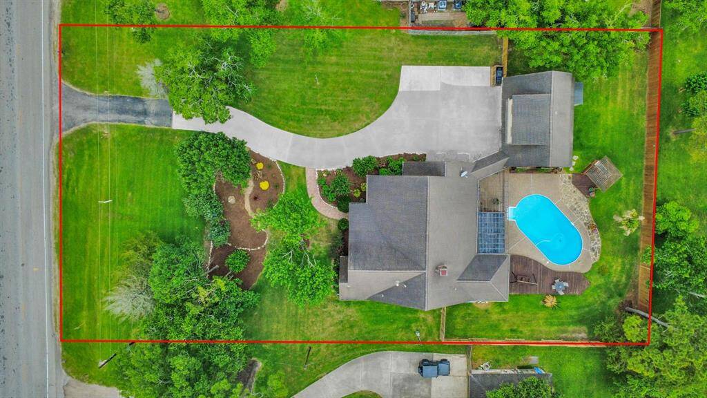 Located on a 0.55 acre lot, this property offers plenty of space for entertaining and play!