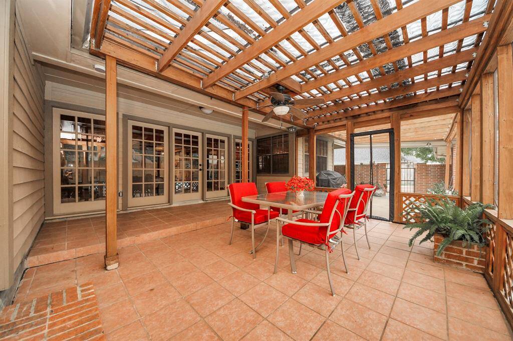 Impressively sized, the exterior patio area is a wonderful place to relax or entertain without worrying about mosquitos!
