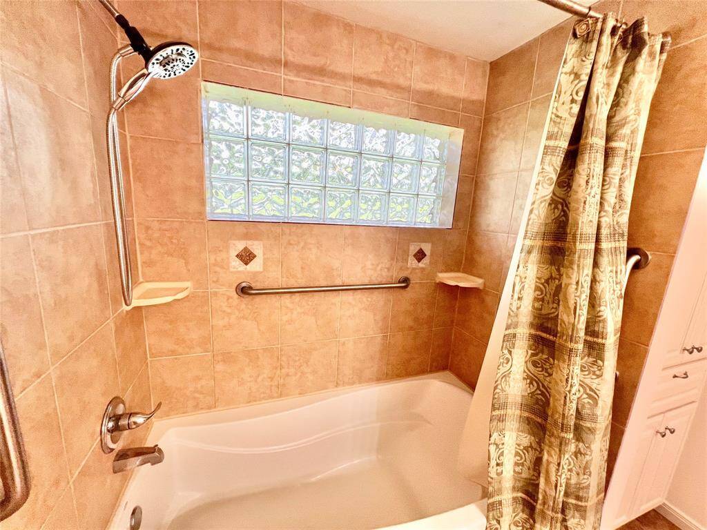 Lots of natural light coming in, notice the large soaking tub.