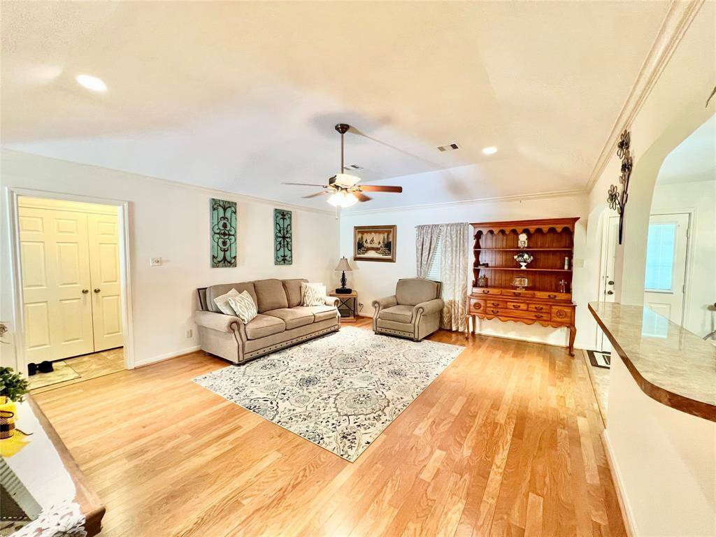 Traveling back through the family room going toward the secondary bedrooms