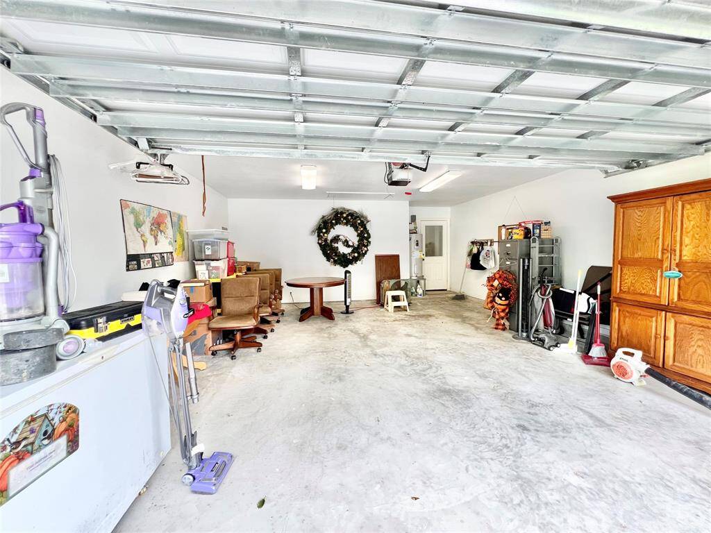 Even the Garage is finished out, sheet rocked, textured and painted, also garage door opener and access to the decked storage above it.