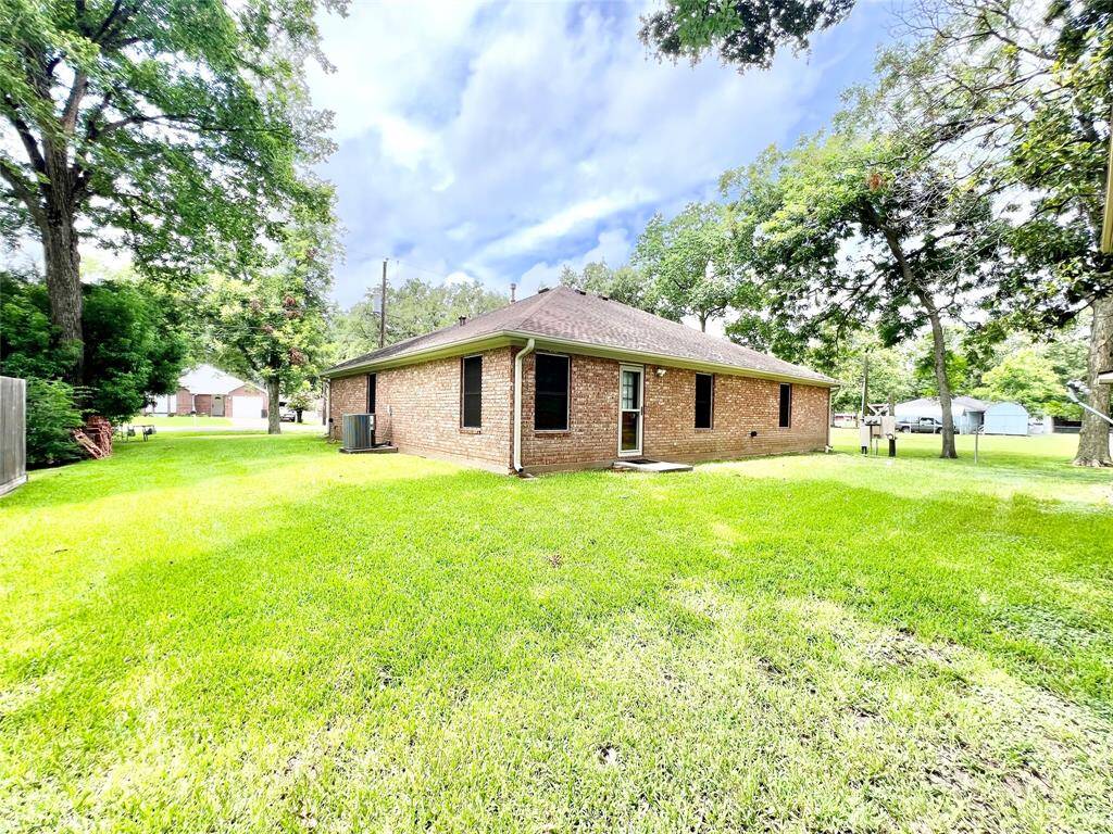 Plethora of room to put up a privacy fence to further separate the main home from the income producing garage apartment if you desire, view from Garage Apartment.