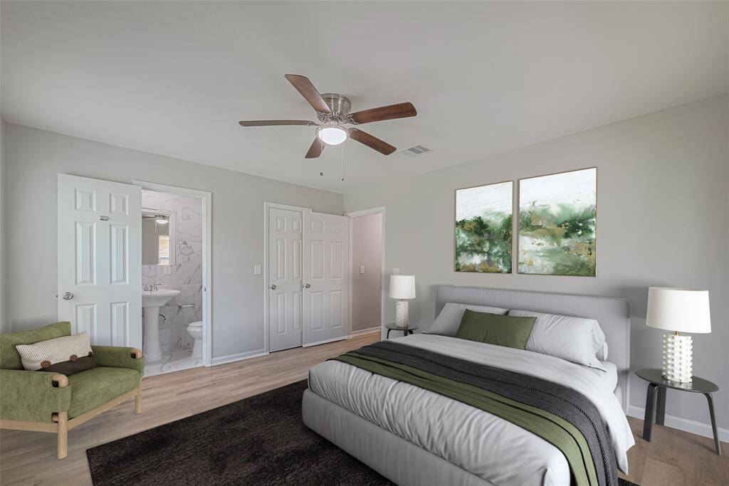 This restful primary bedroom has an en suite bath, ceiling fan, and ample room to personalize with your favorite furnishings. *virtually staged*